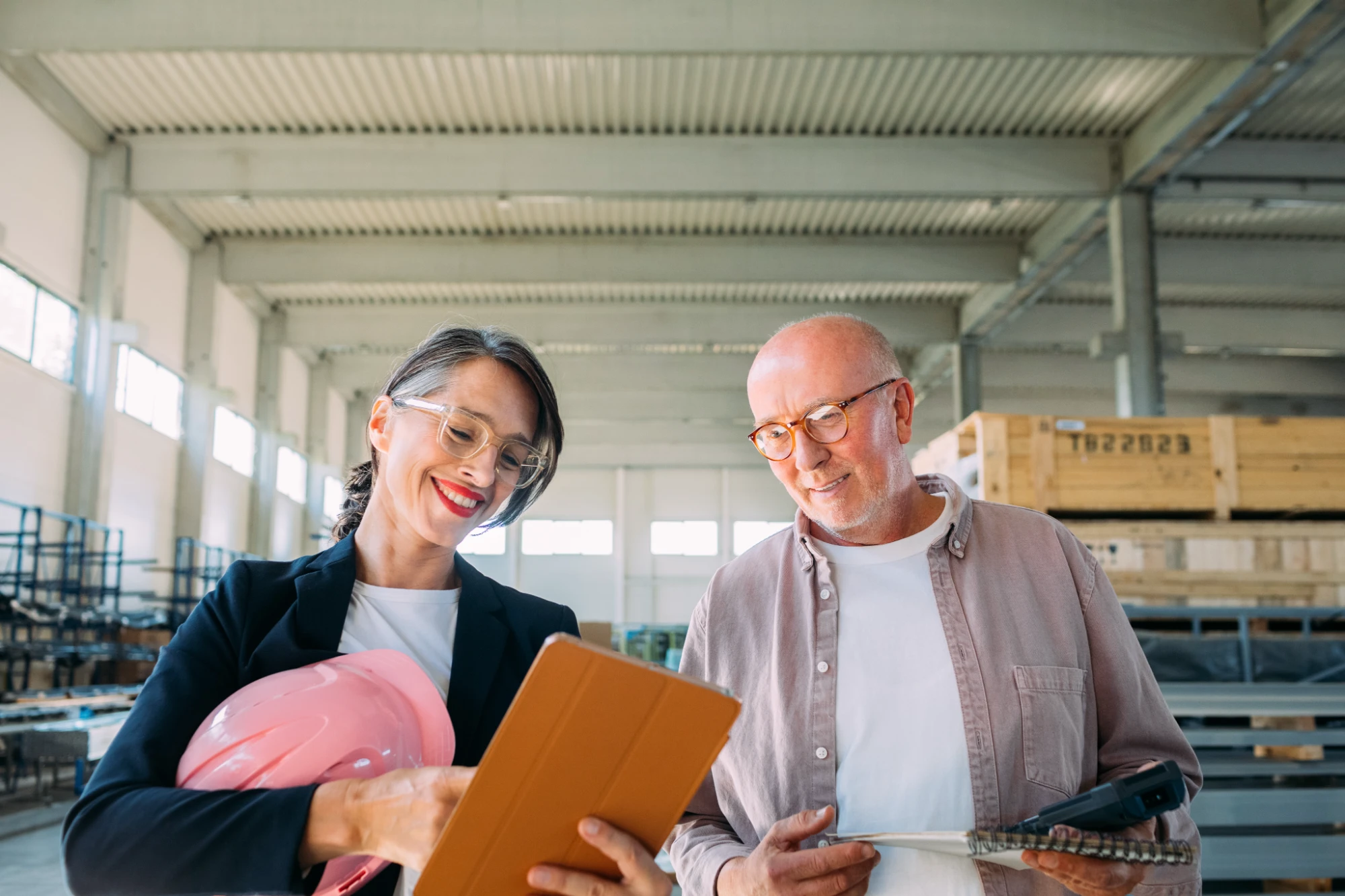 Two business owners reviewing documents together
